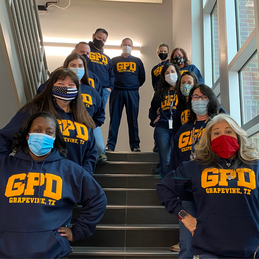 men and women wearing matching GPD sweatshirts